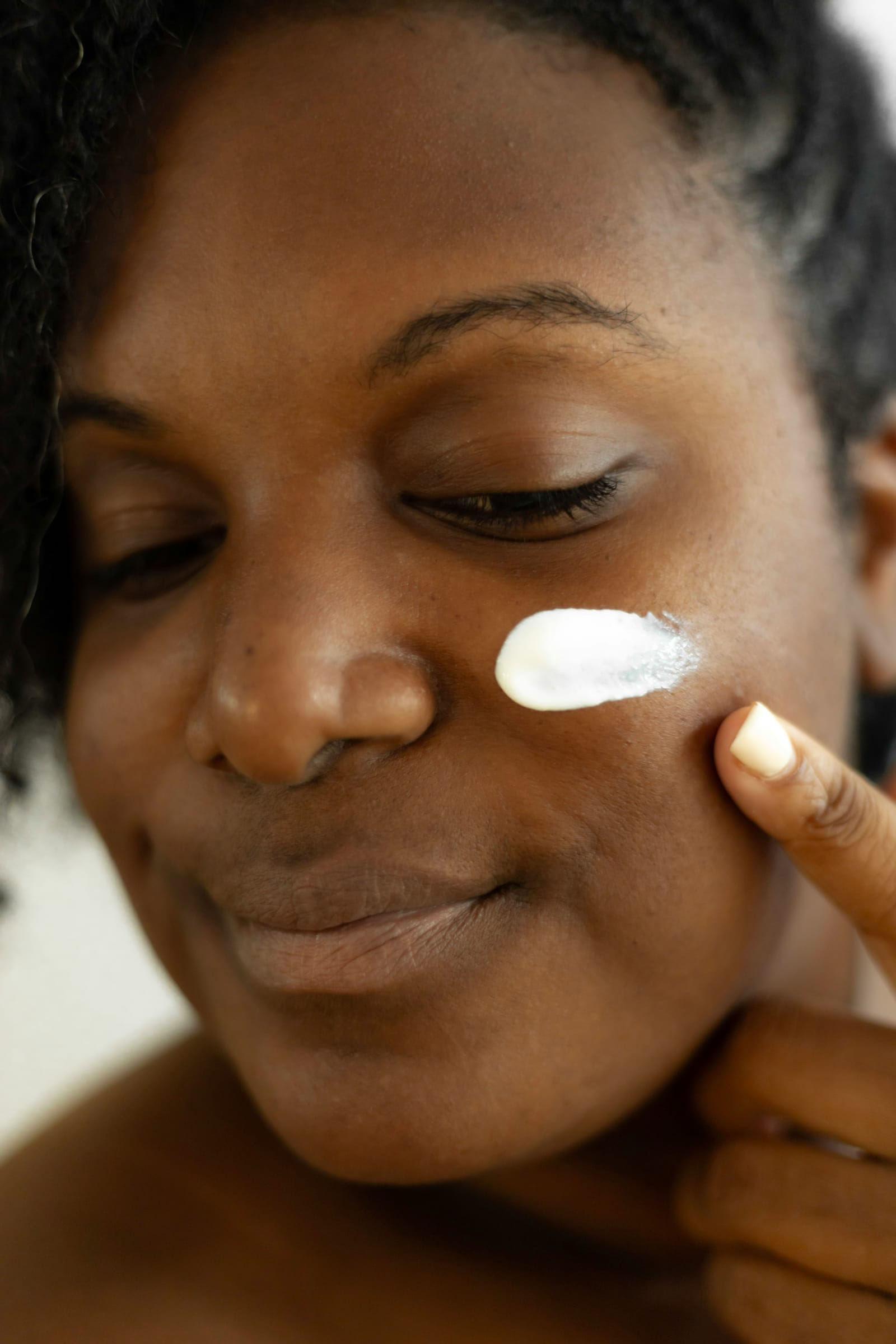 Moisturiser applied to the cheek